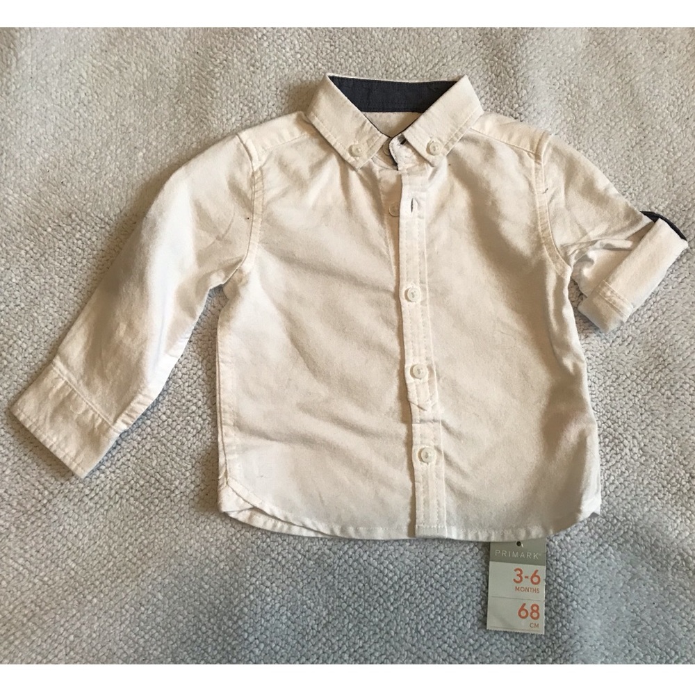Baby Boy White Shirt, with adjustable sleeves.